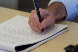 Student working on their certificate of finance