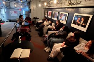 Communication students networking with grads