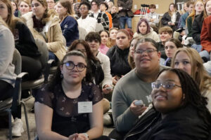 Students participating in trivia at accepted student event.