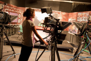 Student working with a camera