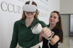 Occupational Therapy students practicing with virtual reality equipment