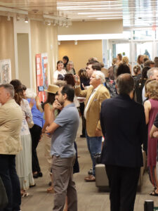 Visitors enjoying the opening of the exhibit