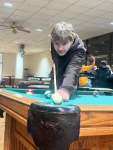 Students playing trivia at the pub