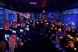 Graduate students gathering for a break to play laser tag