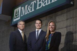 Le Moyne College graduate with team from M&T Bank