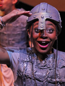 Student performing in Beowulf