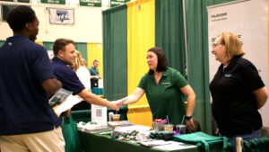 Students meeting with companies at the Employer Fair