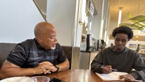 Kenyon Black with Student