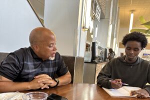 Kenyon Black with Student