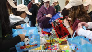 Students making care kits at DIVE Day